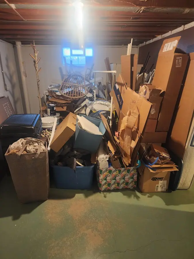 Roll-off dumpster container at job site for Roll Off Dumpster Rental in Crosby